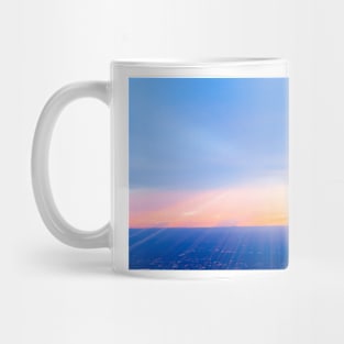 Abstract sunset across urban and desert landscape Mug